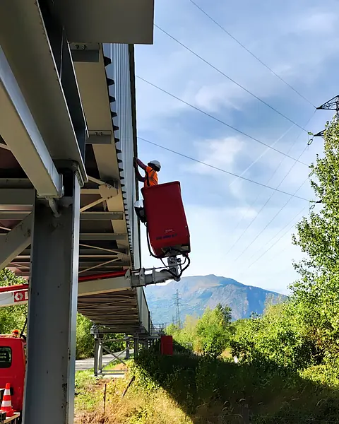 Chantier iTelco : caméra fixée sous un convoyeur industriel